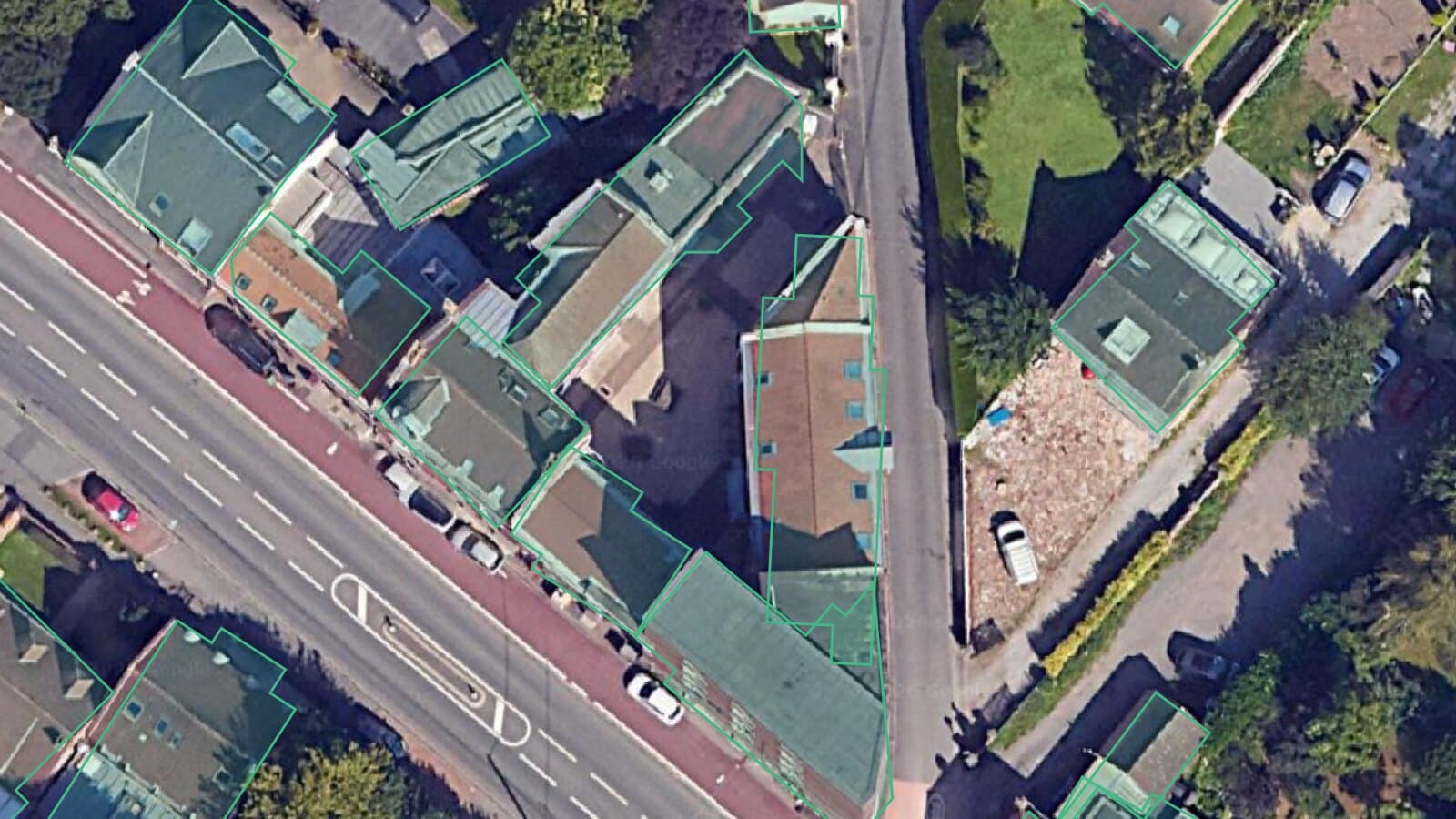 Close view of detected building outlines on aerial imagery, corners meeting at right angles