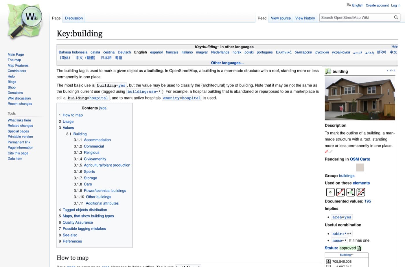 The OpenStreetMap wiki page for the building key, with the description defining a building as a man-made structure with a roof standing more or less permanently in one place, and the tag values table below it