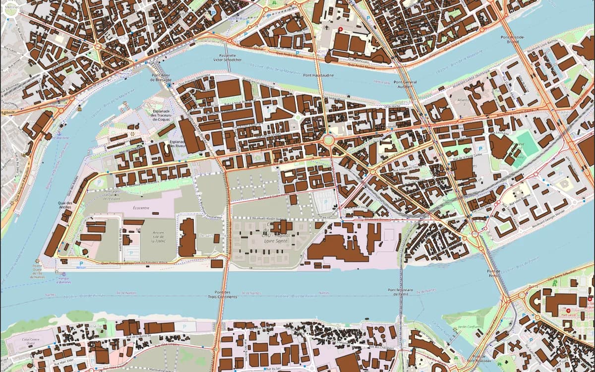 The same extent with OpenStreetMap buildings and labelled main roads loaded and styled