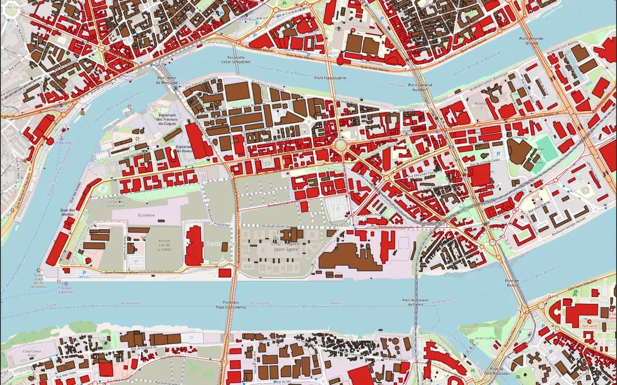 The same map with the buildings within 50 m of a main road in a new red layer