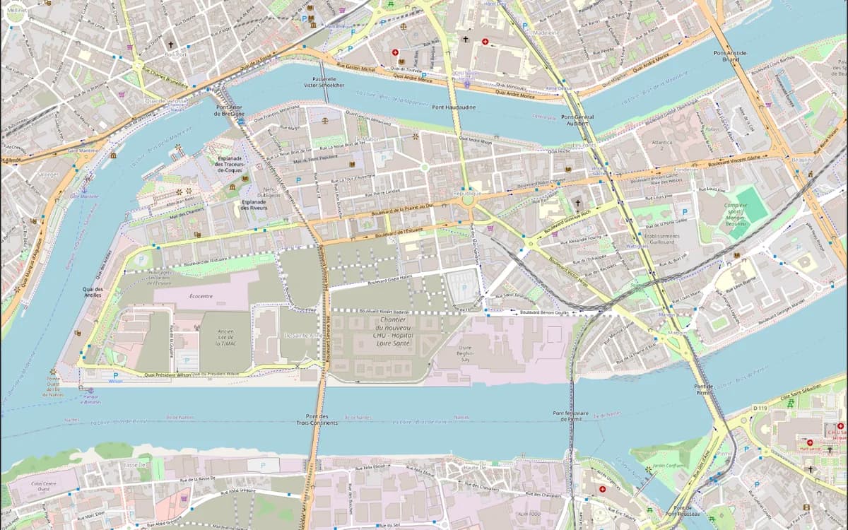 QGIS map canvas showing a bare OpenStreetMap basemap over Nantes