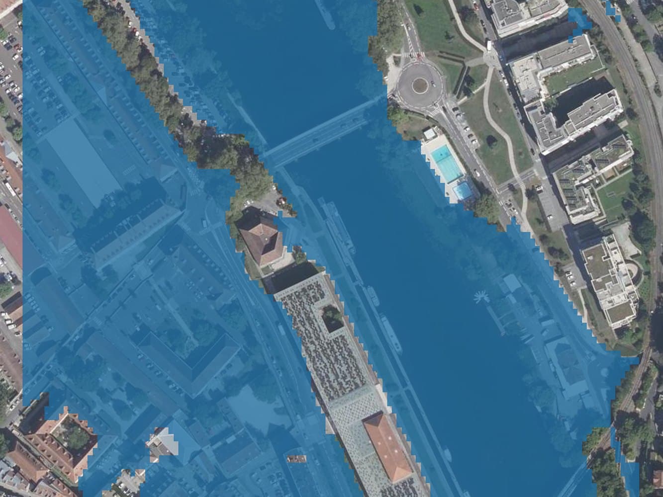 The same view at a water level of 246 m, with blue covering almost the entire frame including streets and building blocks.