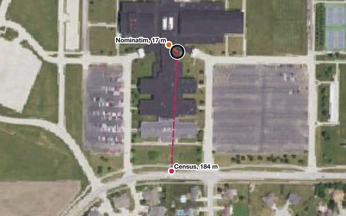 Aerial image of Glenwood High School in Chatham, Illinois. A black ring marks the official school point on the building, an orange Nominatim point sits 17 m away, and a pink Census point sits 184 m south on Plummer Boulevard.