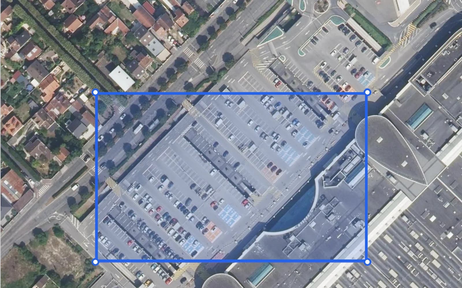 AI Edit panel in QGIS with a zone drawn over a car park