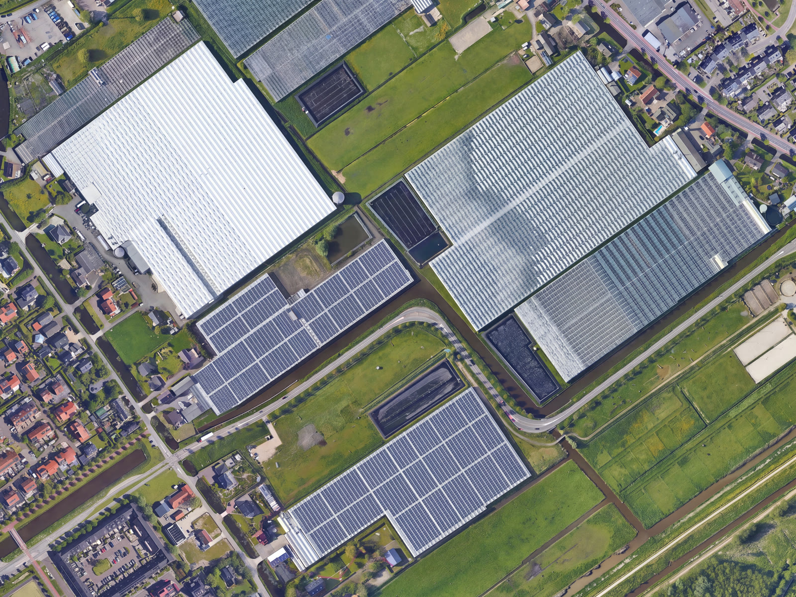Greenhouse roofs covered with solar panels inside the purple markup (after)