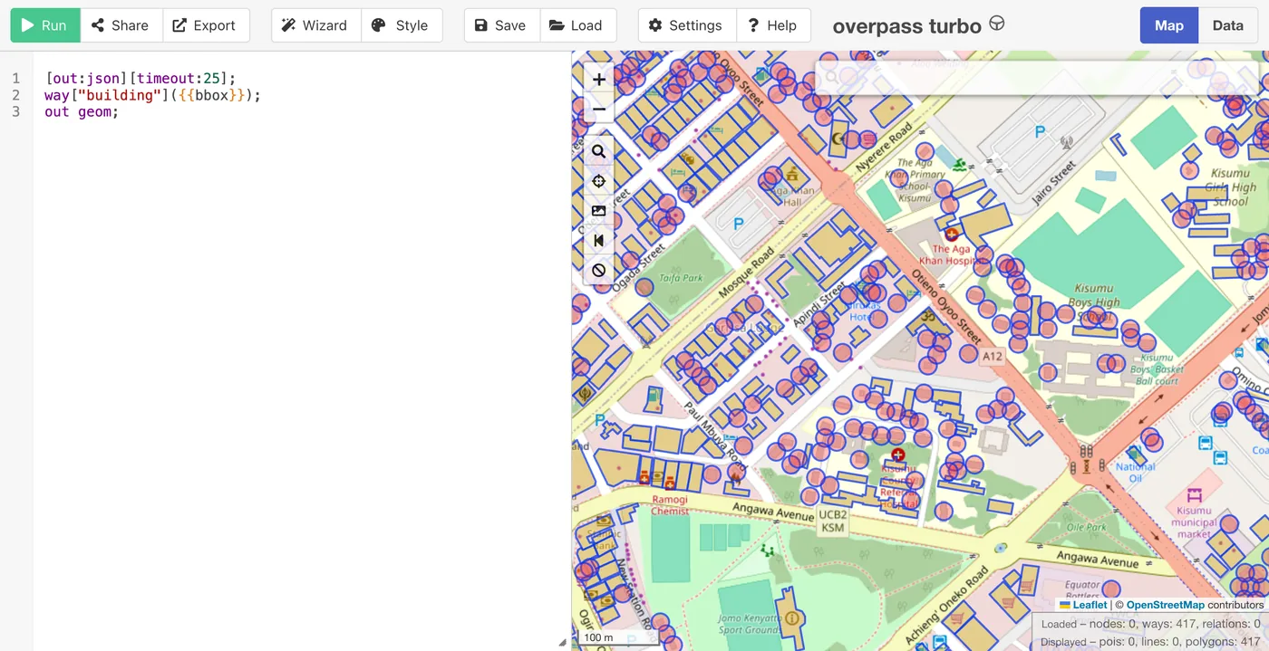 Overpass Turbo with a three-line building query on the left and central Kisumu on the right with building outlines highlighted in blue. The status line reads 417 ways loaded.