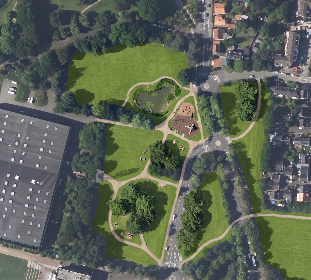 The same aerial view with the car parks replaced by lawn, trees, paths, a pond and a play area (after)